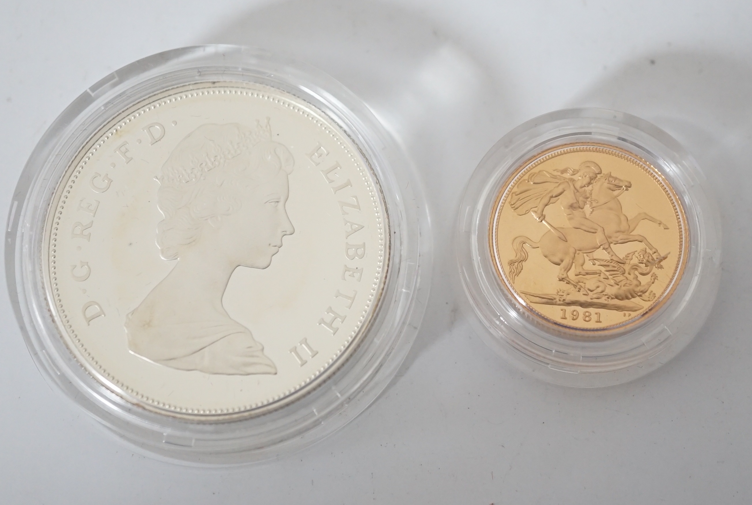 Elizabeth II gold and silver proof coins, Royal Mint UK two coin commemorative set, comprising 1981 proof gold sovereign and Royal Marriage proof silver crown, in case of issue with certificate